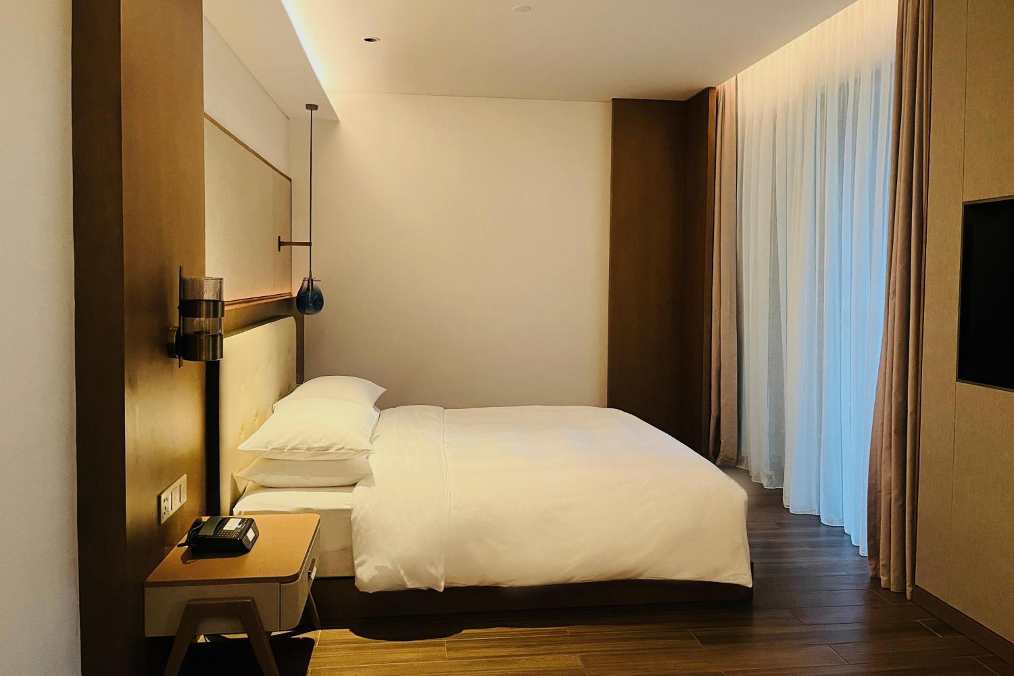 Wingate By Wyndham Hainan Chengmai Exteriör bild